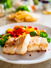 Fish dish - fried fish fillet and vegetables