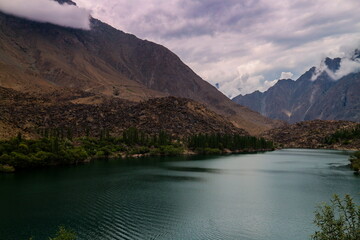 view of Kachura lake with mountain and foliage, Skardu, Gilgit Baltistan, Pakistan.