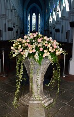 flower arrangement  for a wedding at the entrance of a church in singapore