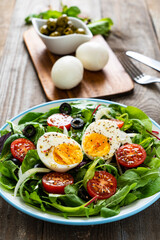 Salad with boiled egg and vegetables