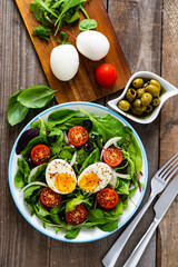 Salad with boiled egg and vegetables