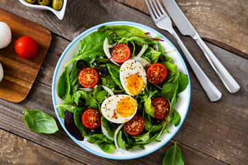 Salad with boiled egg and vegetables