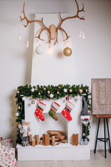 Christmas decor, gifts are near the fireplace wooden toys, New Year.