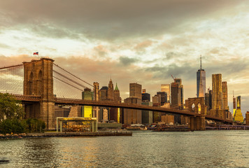 Sunrise at Brooklyn Bridge Park with view to Manhattan Skyline.