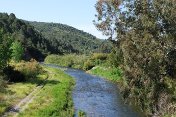 River Genal with views towards the mountains near Gaucin, Spain.