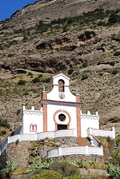 Whitewashed Spanish church in the mountains, Chorro Gorge, Spain.