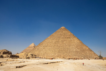 Fototapeta na wymiar The Great Pyramid of Giza ( Pyramid of Khufu or the Pyramid of Cheops) is the oldest and largest of the three pyramids in the Giza pyramid complex