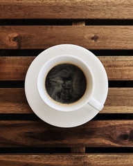 Coffee on wooden background. shot espresso
