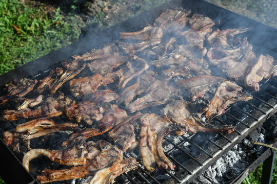 Lamb chops roasting on the barbecue