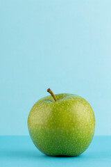 Creative layout made of green apples. Flat lay. Food concept.