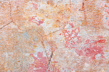 Texture of a concrete wall with cracks and scratches which can be used as a background