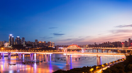 Fototapeta premium night view of the city, with two bridges and Yangtze River. in chongqing, china.