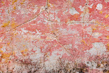 Texture of a concrete wall with cracks and scratches which can be used as a background