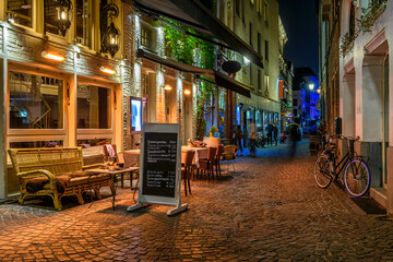Naklejka na ściany i meble Old street of the historic city center of Antwerpen (Antwerp), Belgium. Cozy cityscape of Antwerp. Architecture and landmark of Antwerpen