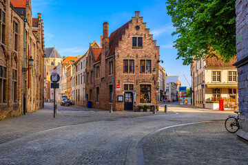 Fototapeta premium Old street in Bruges (Brugge), Belgium. Cityscape of Bruges. Typical architecture of Bruges