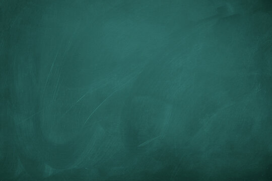 Texture of chalk on green blackboard / chalkboard background, can be use as concept for school education, dark wall backdrop , design template.