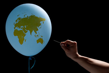Planet earth has a fragile environment. Risk burst with a needle like a balloon