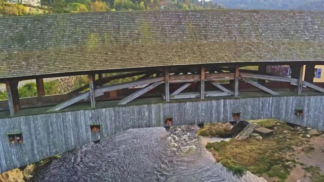 4k Aerial view of wood bridge over Murg river, Forbach, Germany