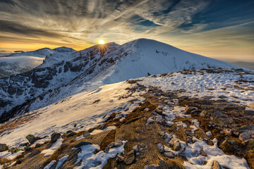 Sunset in Kopa Kondracka in Polish Tatra Mountains in winter snow weather conditions