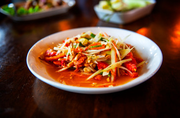 Papaya salad, delicious, sweet and sour, spicy seasoning cooking from papaya a popular country Thailand