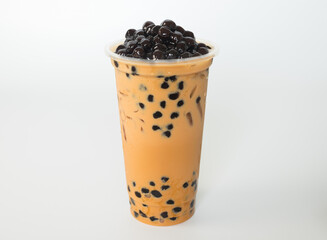 Fototapeta na wymiar Taiwan milk tea with bubble plastic glass on wood background
