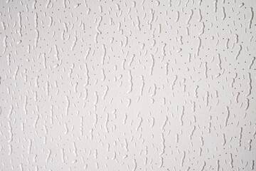 wallpaper with pattern in the form of irregular and discontinuous vertical worms, with dots and stripes, shaded and in white and gray tones