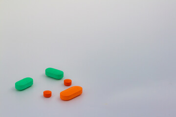 Medicines on neutral background. Concept of legal drug abuse. Medications in the form of pills or capsules.