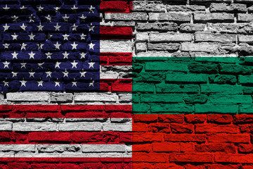 Flag of Bulgaria and the United States of America on brick wall