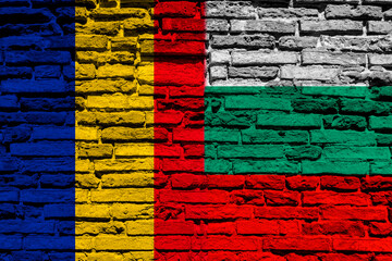 Flag of Bulgaria and Belgium on brick wall
