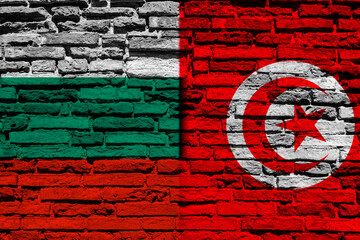Flag of Bulgaria and Tunisia on brick wall
