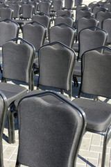 Obraz premium Rows of gray chairs. Street concert, conference, presentation.