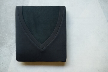 Black t-shirts folded for winter season, technology from japan that call Heattech