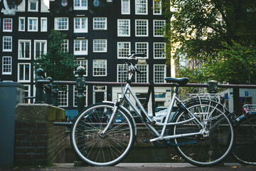 Bicycle on Amsterdam street. Cityscape.