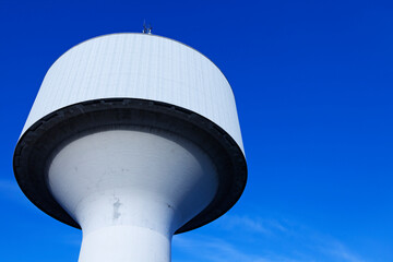 Umea, Norrland Sweden - October 10, 2019: water tower seen a bit away with blue sky