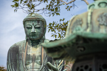 The Great Buddha of Kamakura Kanagawa, Kotoku-in Temple, Japan. Bronze japanese lantern in...