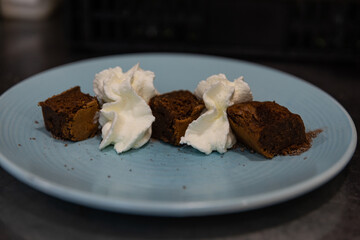 Chocolate dessert in a white plate.
