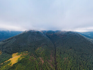 Panorama of Frozen mountain with trees in autumn