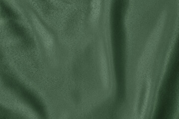 Dark green colored Background of soft draped fabric. Beautiful satin silk textured cloth for making...