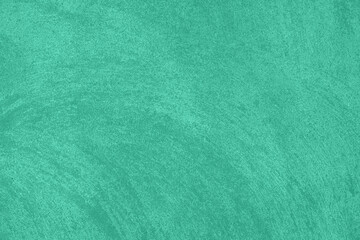 Trendy mint colored low contrast Concrete textured background with roughness and irregularities to...