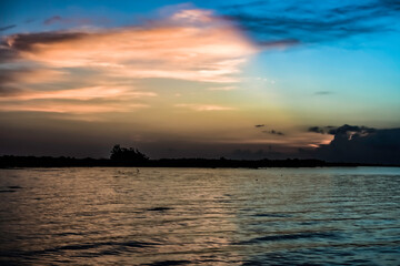 sunrise clouds over lake