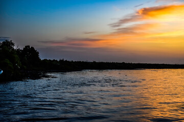 Fototapeta premium clouds over lake at dawn