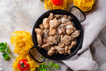 Stewed chicken fillet with mushrooms