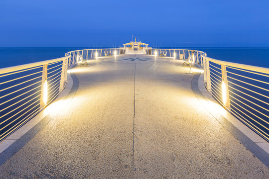 Fototapeta Lido di Camaiore pier illuminated at dawn, Lucca province, Versilia, Tuscany, Italy, Europe