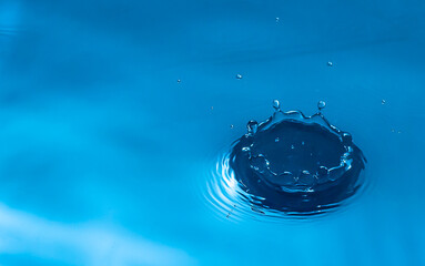  water drop and water splash, blue water surface