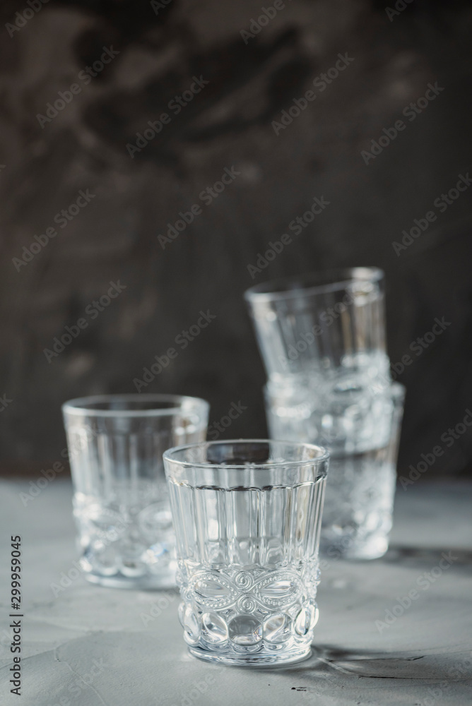 Wall mural mix of empty table glasses