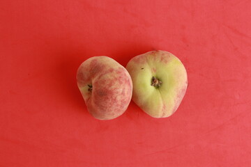 Paraguayan peach on colorful background