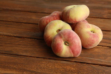 Paraguayan peach on wooden background
