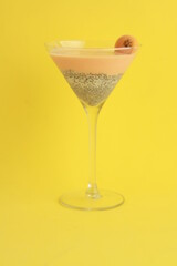 glass with chia and medlars pudding