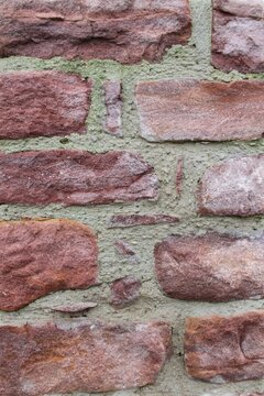 mur pierres rouges 