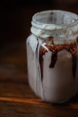 Milkshake (chocolate smoothie) in a jar,